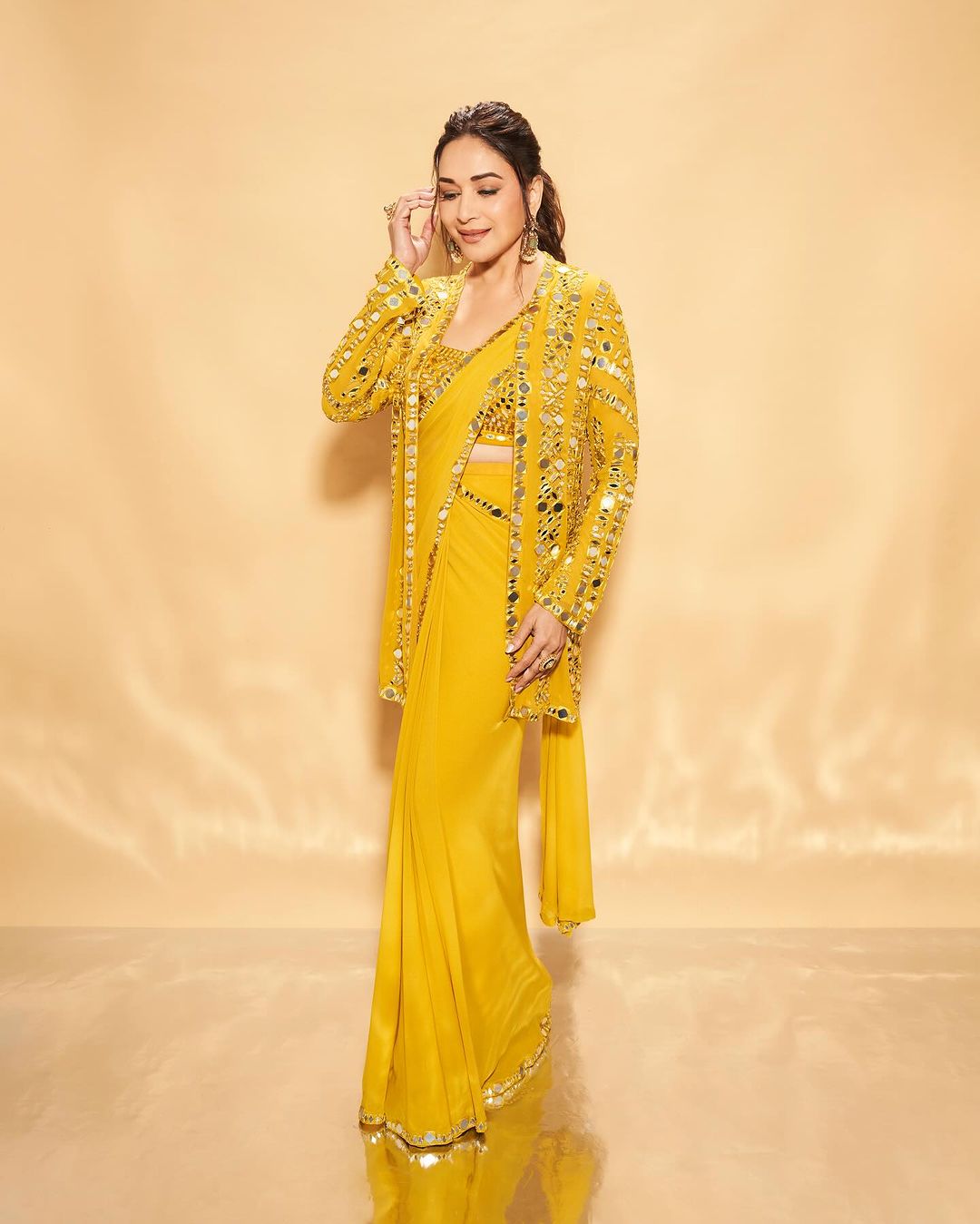 Madhuri Dixit looks like a ray of sunshine dressed in yellow